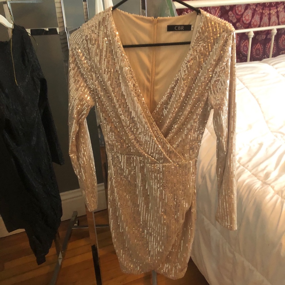 2 dresses one sweater and a jogger romper